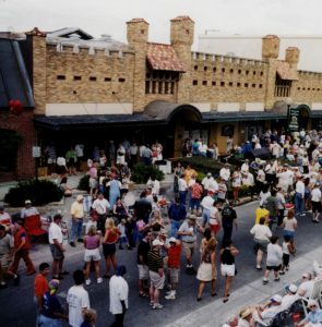 A crowd of people at an outdoors festival